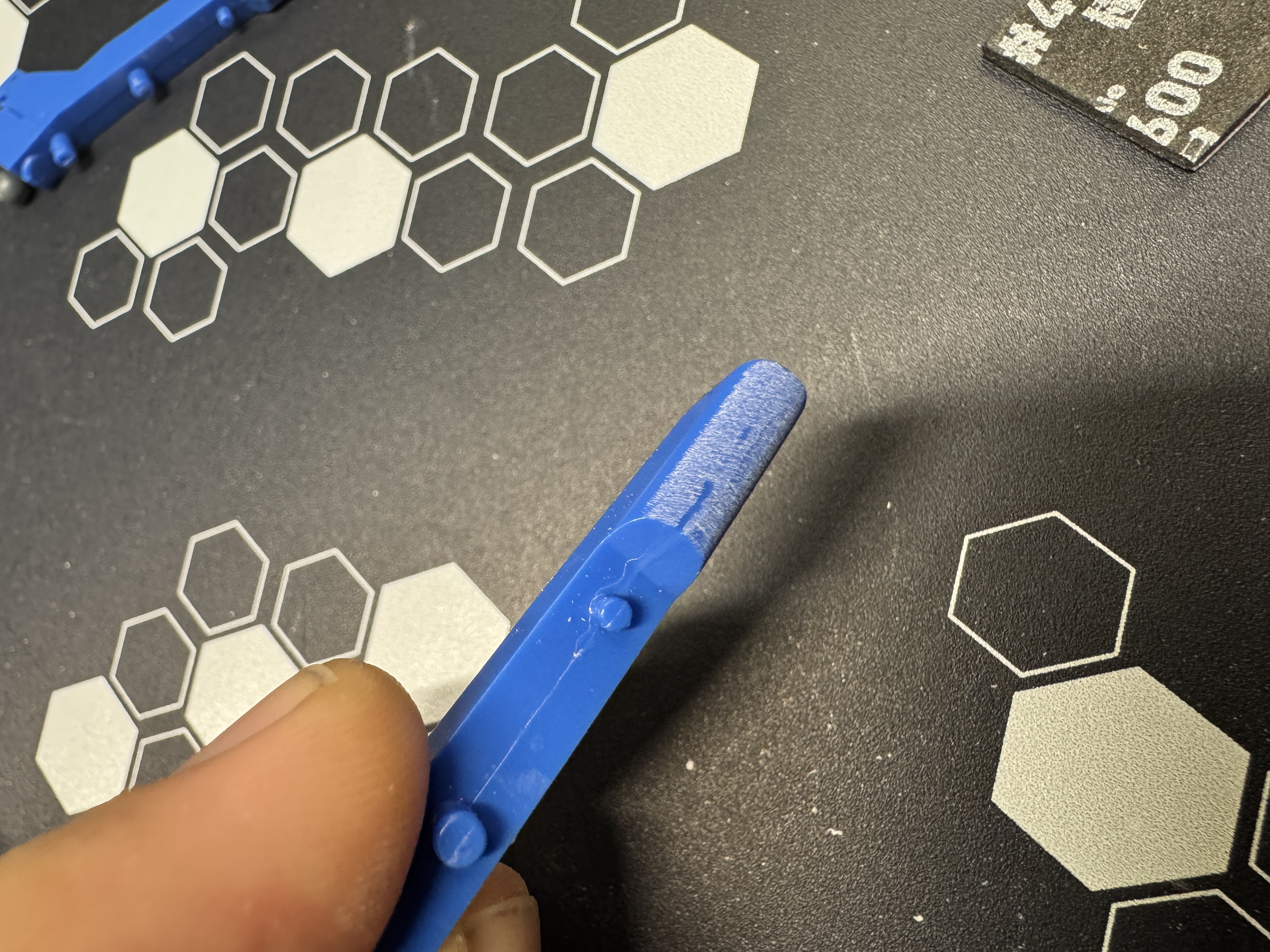 Sand with 400 grit until seam is gone